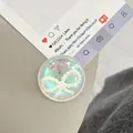Detail of clear resin phone grip featuring white pearl bow and iridescent laser finish - Dreamy Bubble Crystal Ball Style (87)