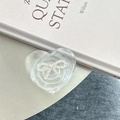 Macro detail of clear heart phone grip with sparkling rhinestone bowknot embellishment - 3D Heart Stand - Bowknot Series - No. 7