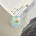 Detail of transparent heart phone grip with mint green base and pink floral glitter accents - Dreamy Bubble Crystal Ball Style (93)