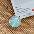 Close-up of heart crystal ball phone grip with laser sequins on woven mat - Dreamy Bubble No. 113