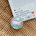 Detail of iridescent aurora phone grip featuring a cute pink fish bone design inside - Dreamy Bubble No. 106