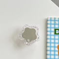 Macro view of flower-shaped phone grip with glitter acrylic edge and central mirror - Transparent Glitter Flower Mirror - Pink