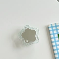 Detail of floral magnetic phone grip with green glitter, mirror center, and mi ne. logo - Transparent Glitter Flower Mirror - Green