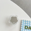 Detail view of flower-shaped phone grip with glitter resin and mirror surface - Transparent Glitter Flower Mirror - Silver