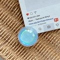 Detailed view of iridescent heart crystal ball phone grip with blue pearlescent laser finish - Dreamy Bubble No. 111