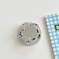 Macro shot of circular phone grip with sparkling glitter, crystal rim and built-in mirror - Magnetic Glitter Flower Mirror - Black
