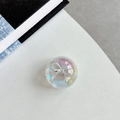 Macro shot of an aurora crystal heart phone grip with a 3D silver bow accent - Crystal Ball Grip - Dreamy Bubble - No. 82