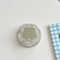 Detail view of flower mirror phone grip with sparkling glitter and rhinestone trim - Magnetic Glitter Flower Mirror - Yellow