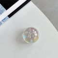 Macro shot of iridescent phone grip featuring a sparkling rhinestone-studded balloon dog - Crystal Ball Grip - Dreamy Bubble - No. 71