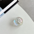 Close-up of iridescent crystal ball phone grip with a silver bear figure inside - Crystal Ball Grip - Dreamy Bubble - No. 76
