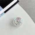 Macro view of iridescent resin phone grip with metallic silver bow detail for girls - Crystal Ball Grip - Dreamy Bubble - No. 79