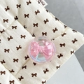 Macro shot of iridescent resin phone grip featuring a 3D pink bow inlay decoration - Crystal Ball Holder-Dreamy Bubble-No.58