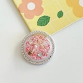Macro-opname van een telefoonhouder met roze glitters, zeester en schelpdetails - Witte Strass Magnetisch - Oceaan Zeester - Rood