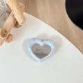 Macro shot of heart-shaped mirror phone grip with speckled finish for makeup retouching - White (Splatter Heart Mirror)
