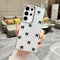 Detailed macro view of transparent glitter phone case decorated with black bows for Samsung S25 Ultra - Black / Samsung A16