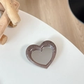 Detail of heart-shaped phone grip with gray-purple stone texture and built-in makeup mirror - Coffee (Splatter Heart Mirror)