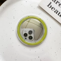 Detail of round MagSafe phone grip with lime green glitter border and makeup mirror - Matcha Green
