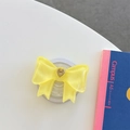 Supporto per telefono a fiocco giallo in resina con dettaglio a cuore su scrivania - Grande Fiocco Magnetico Cuore Francese / Giallo