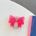 Dettaglio del supporto per telefono a fiocco 3D rosa con decorazione a cuore dorato - Grande Fiocco Magnetico Cuore Francese / Rosa Rossa