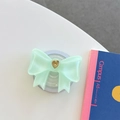 Dettaglio supporto telefono a fiocco verde menta con cuore dorato su scrivania - Grande Fiocco Magnetico Cuore Francese / verde chiaro