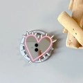 Close-up of heart-shaped phone grip with mirror surface and pink decorative lines - Magnetic Hedgehog Heart Mirror / Deep Pink