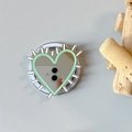 Detail of silver heart-shaped mirror phone grip with mint green border and radial design - Magnetic Hedgehog Heart Mirror / Dark Green