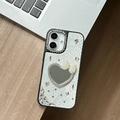 Detail of snake pattern leather iPhone case with rhinestone heart mirror and pearl bow - iPhone XR / White