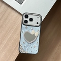 Macro detail of luxury snake skin texture iPhone case with rhinestone heart mirror - iPhone XR / Blue