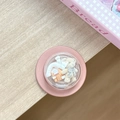 Close-up of pink phone grip with 3D miniature bear and cartoon house inside a clear dome - Magnetic Film Bear House Ball Brown