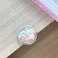 Detailed view of a round phone grip with 3D miniature cat and house inside resin - Transparent Stand Ball House Cat