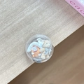 Detail of cute bear and 3D house inside round acrylic expandable phone socket grip - Transparent Stand Ball House Brown Bear