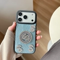 Close-up of luxury leather iPhone case with sparkling rhinestone dollar signs decoration - iPhone 16e / Pearlescent Blue