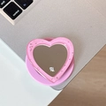 Pink heart mirror phone grip with glitter resin edge on a laptop desk surface - Deep Pink