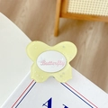 Glittery yellow butterfly phone grip with stars and Butterfly text in a cute resin style - Yellow