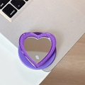 Detail of purple glitter heart phone grip with built-in mirror on a laptop - Dark Purple