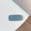 Macro detail of snakeskin texture mirror bracket case in sleek dusty blue finish - Pearlescent Texture / Blue