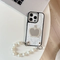 Detail showing snake pattern leather texture with pearl strap and crown heart mirror - White / iPhone XR