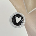 Close-up of magnetic star phone grip with rhinestone border and 'mine' heart design - Black