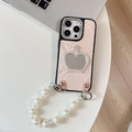 Pink snakeskin texture iPhone case featuring a pearl chain strap and crown mirror detail - Pink / iPhone XR