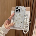 Wavy edge tulip floral iPhone case with pearl bow charm and glitter texture - Cream Case-White Sparkle Drip-Pearl Tulip + Heavy Bracelet / iPhone 17 Pro Max