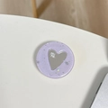 Dettaglio del supporto per telefono in resina glitter viola con specchio a cuore - Trasparente-Specchio Cuore Stellato-Viola Chiaro