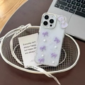 Detailed shot of transparent glitter iPhone case with purple bows and pearls in a basket - Purple (Starry Drip Glue Macaron Pearl Bow) / iPhone 17 Pro Max