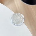 Macro detail of transparent heart-shaped phone grip with butterfly relief and white base - 3D Heart Bow (No.15)