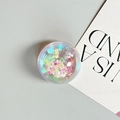 Close-up of a round transparent phone grip with colorful holographic sequins inside - Dreamy Bubble No. 10