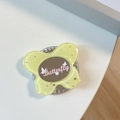 Close-up of glitter butterfly phone socket with built-in makeup mirror and crystal rim - Starry Sky Butterfly Mirror - Yellow