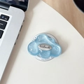 Detail shot of a glittery blue cloud phone grip with a silver handmade metal plate - Magnetic-Silver Cloud-Glitter Blue