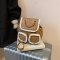 Brown leather backpack with white faux shearling trim and stylish chain handles - Brown
