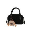 Schwarze Retro Bowling Handtasche mit braunem Plüsch-Anhänger und Schultergurt auf Weiß - Schwarz