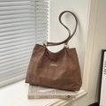Large dark brown tote bag with diamond embossed texture and Creative Cat label - Brown