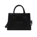 Minimalist black trapezoid handbag with top handles and adjustable shoulder strap - Black